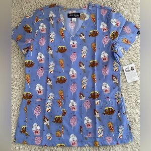 Koi x Krissy Mast Scrub Top